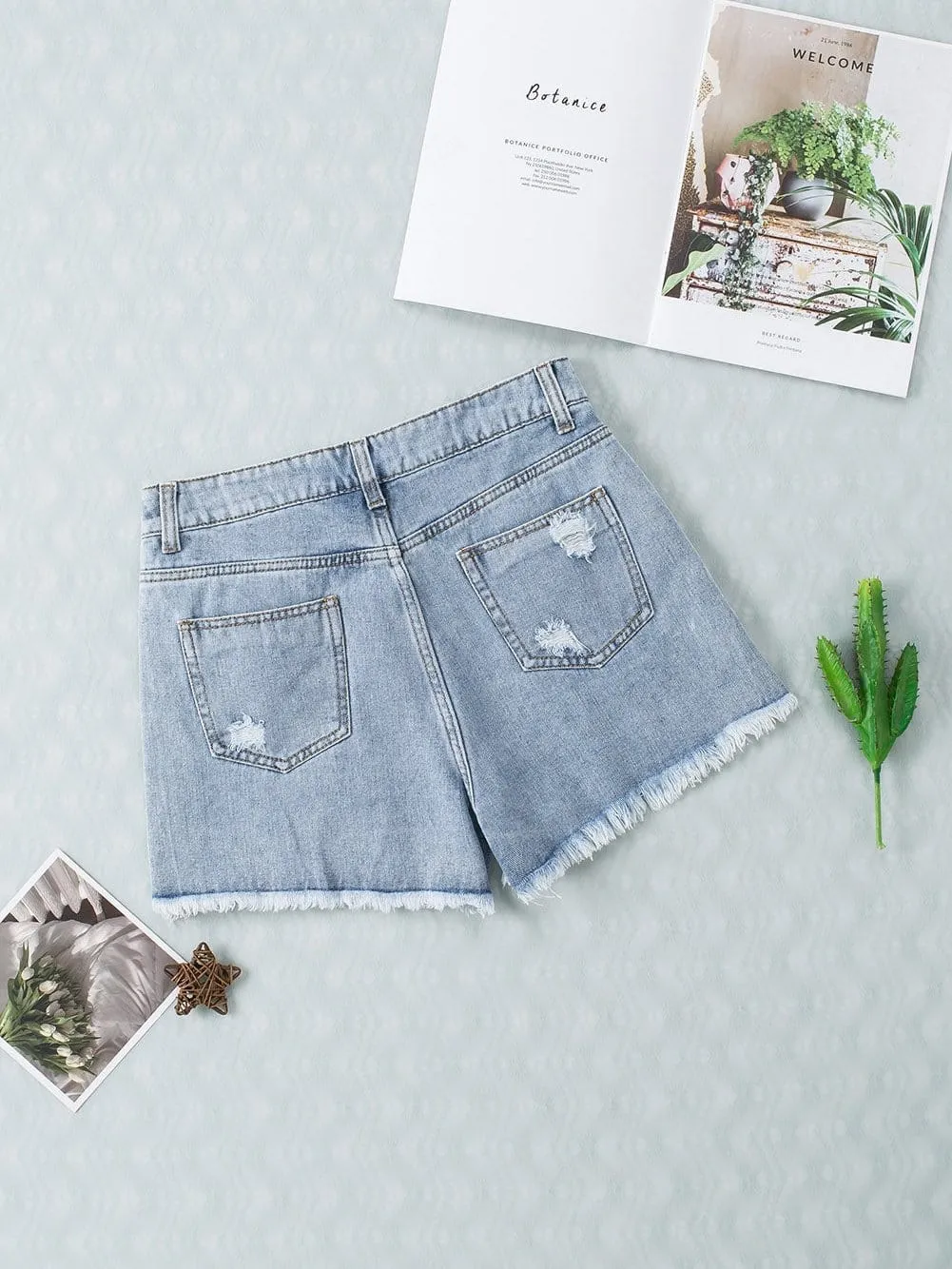 Blue Denim Shorts with Unique Rhinestone Design